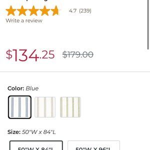 TWO BALLARD DESIGN NAVY-WHITE CURTAIN PANELS AND RINGS